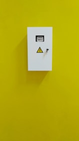 small rectangular white cordless device