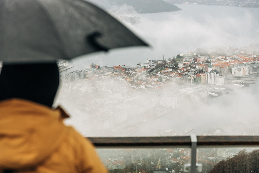 village surrounded by fog