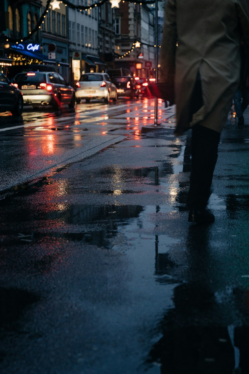 vehicles on road during rainy day