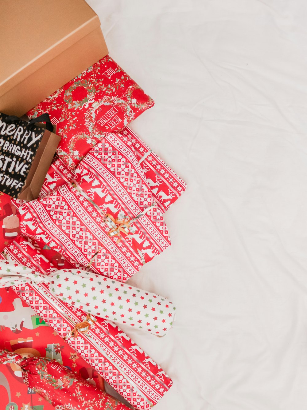 Christmas gifts on bed