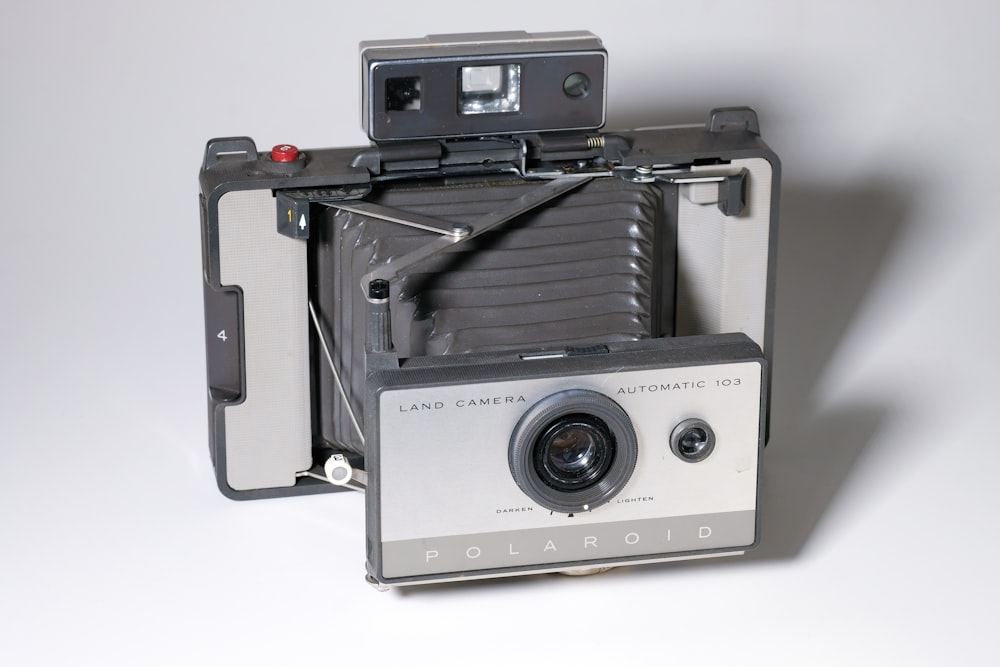 gray and black Polaroid land camera photo – Free Grey Image on Unsplash