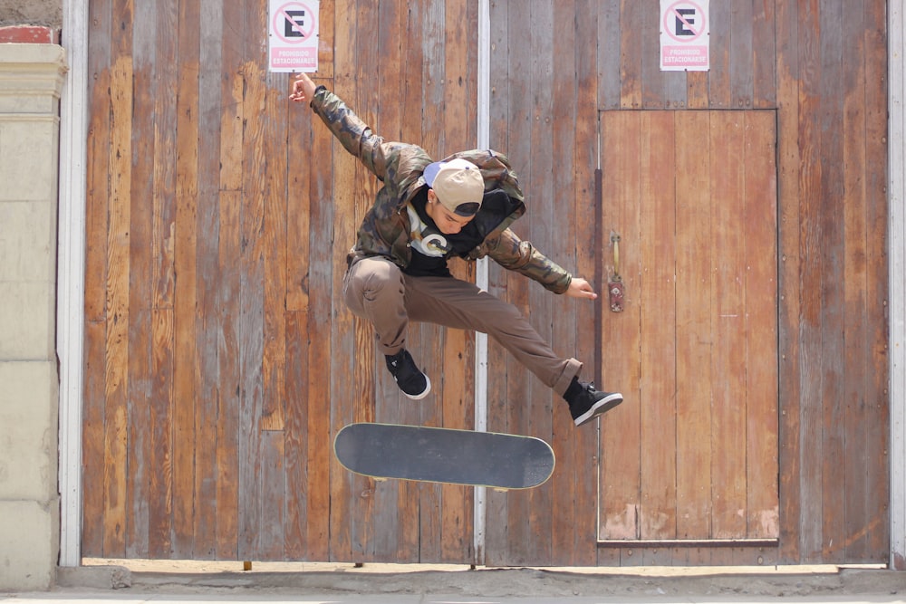 man playing skateboard trick