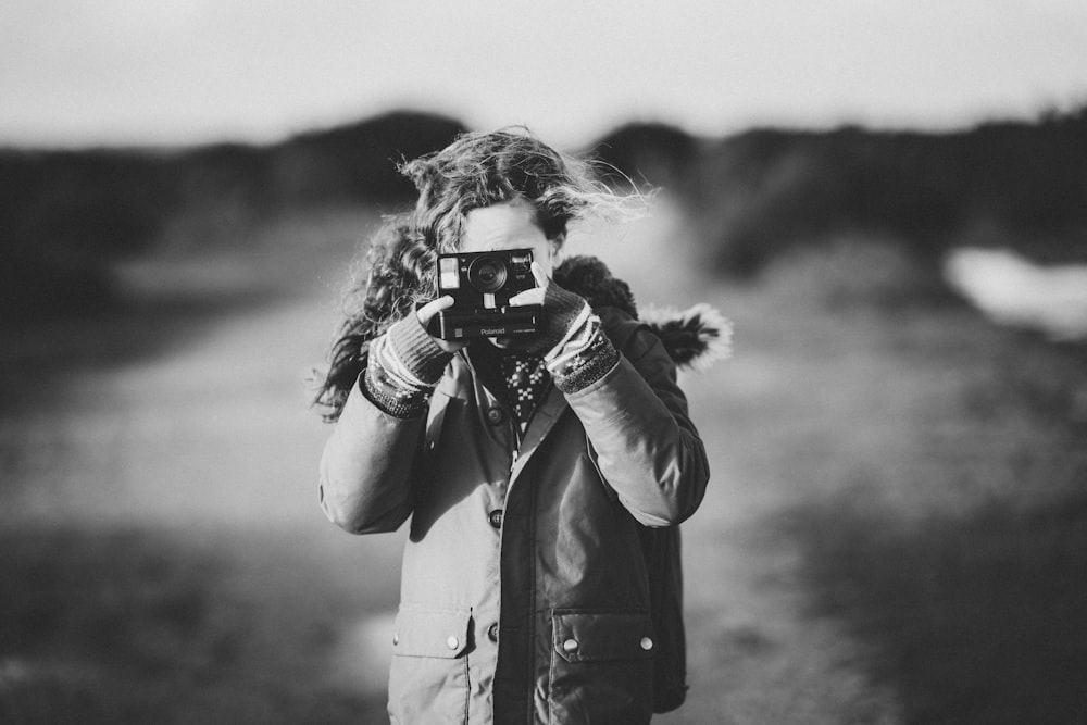 woman taking photo