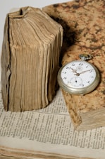 silver-colored pocketwatch at 10:20