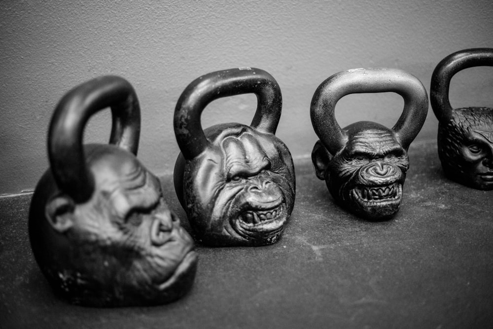 four apes kettlebells on pavement