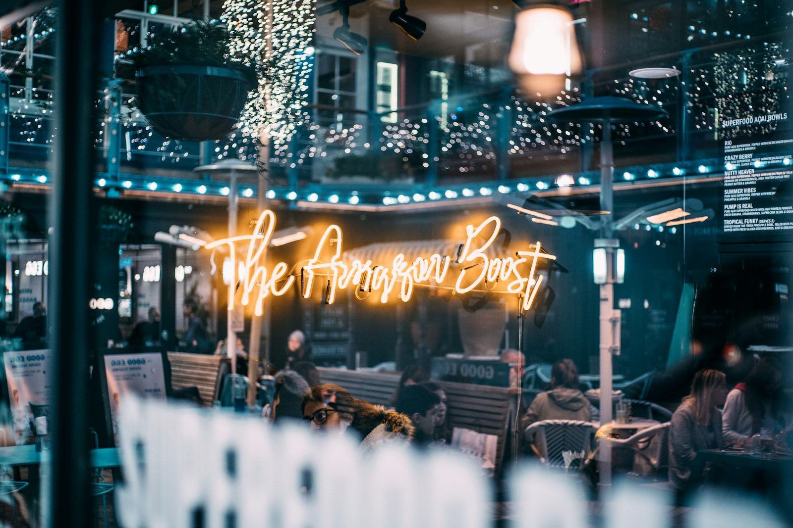 Sony a7 III + Sony DT 50mm F1.8 SAM sample photo. People dining inside cafe photography