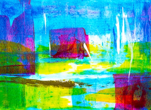 An abstract painting featuring vibrant hues and a mix of geometric shapes and patterns. The artwork showcases a blend of blues, greens, yellows, and magentas, with brushstrokes and textures adding depth and energy. White streaks and overlays provide contrast and dynamism.