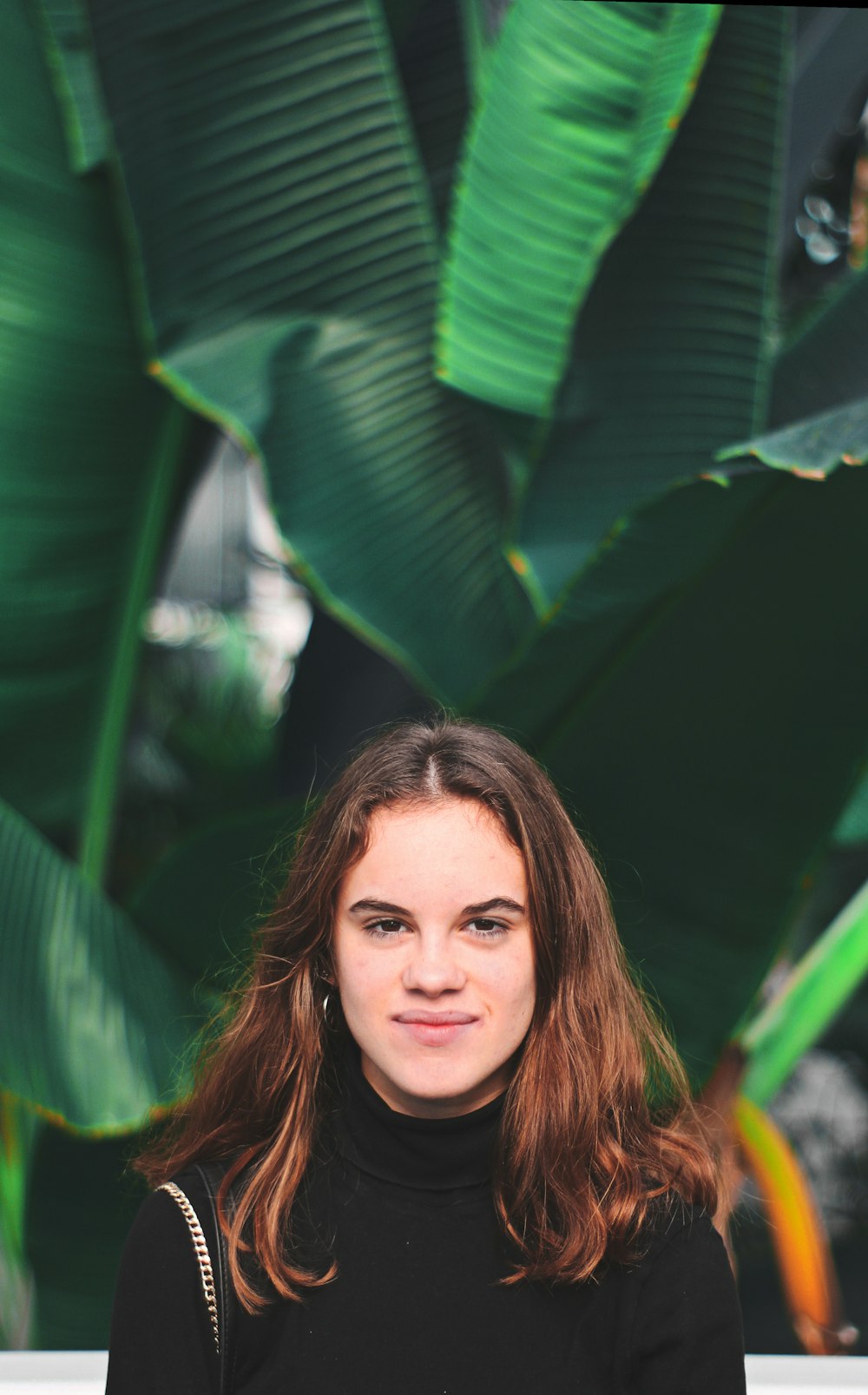 woman wearing black crew-neck shirt