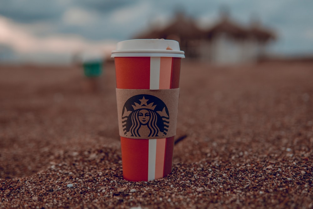 red and pink StarBucks cup