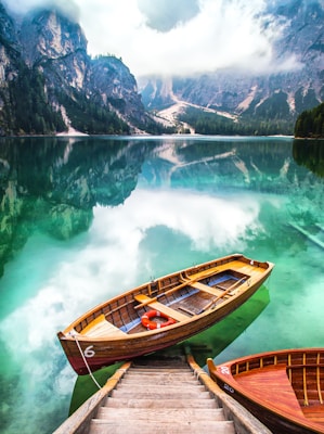 brown gondola on body of water