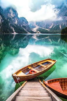 brown gondola on body of water