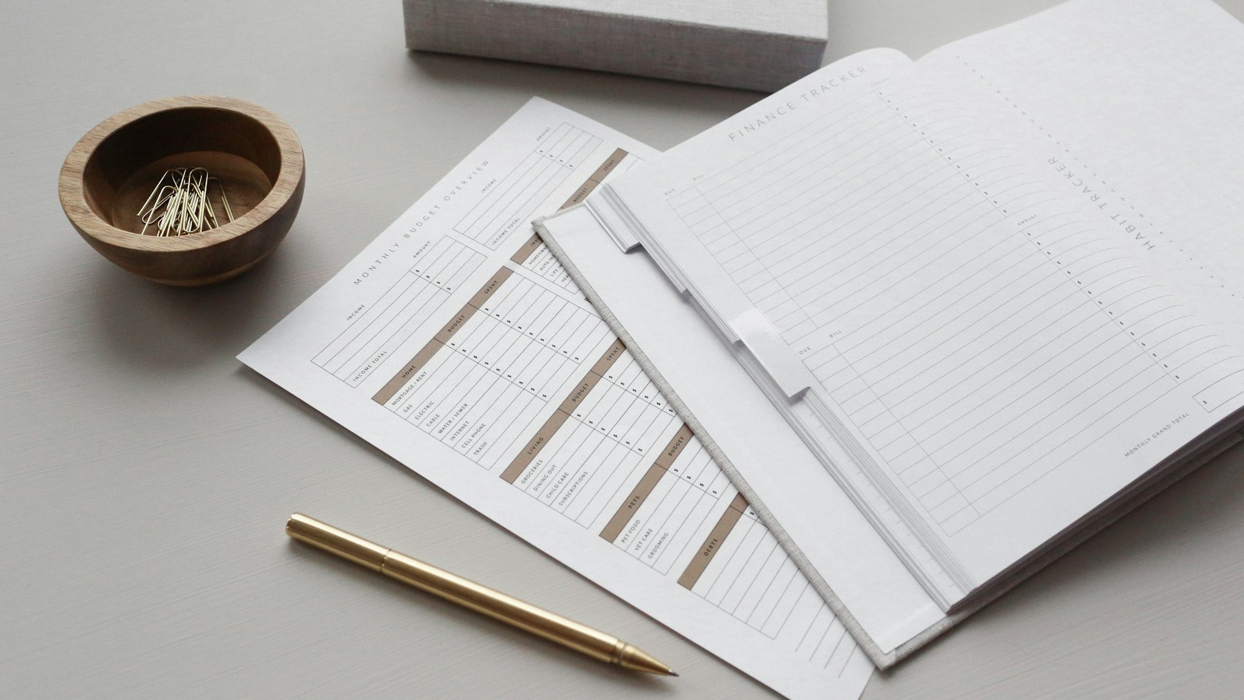 Travel documents, currency, and application forms on a table.