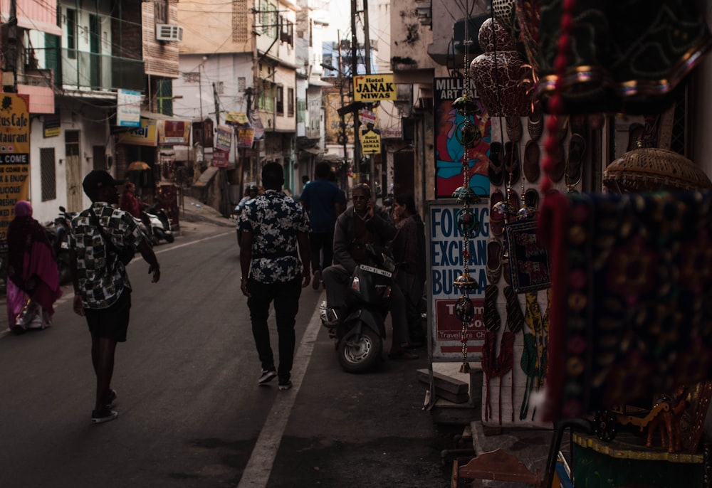 group of people walking on street