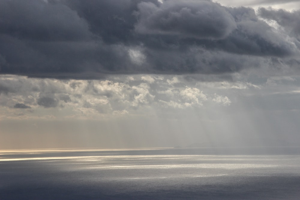 grey rain cloud over the sea
