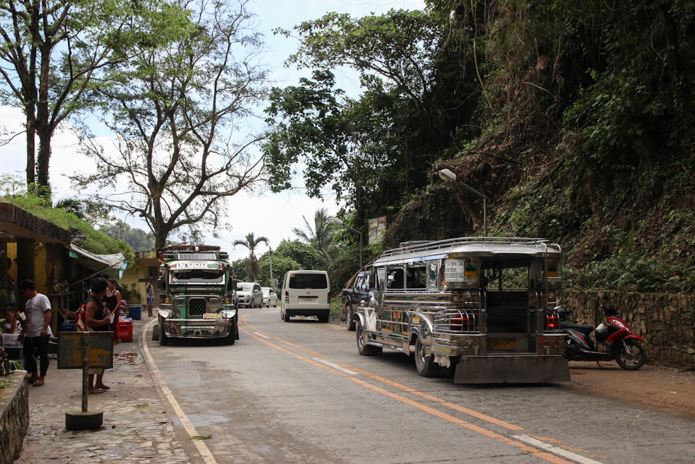 grey vehicles on road