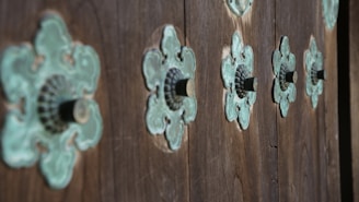 Custom-made metal studs lined up for quality check.