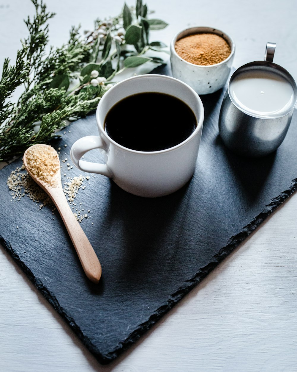 white ceramic mug with coffee