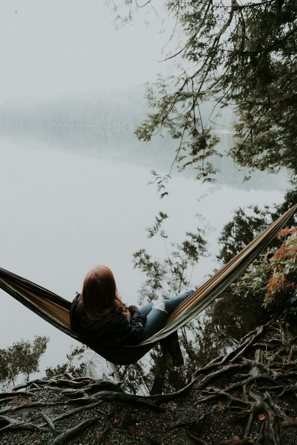 woman sitting on hammock