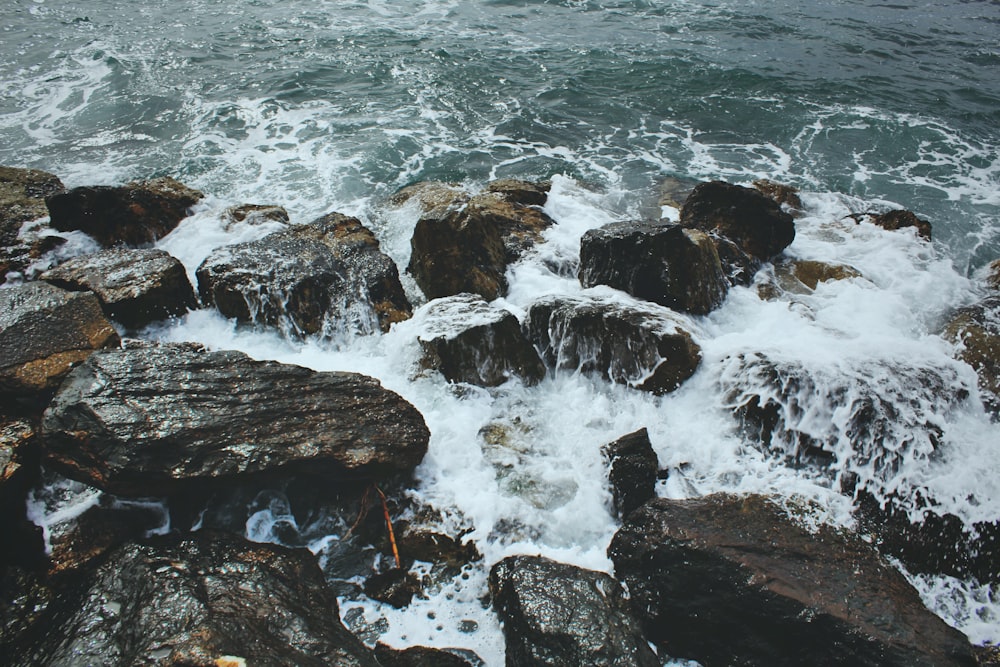 stone on the ocean photography