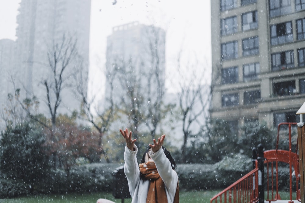 woman catching show during daytime