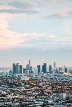 cityscape under white cloud and blue sky during datyiem