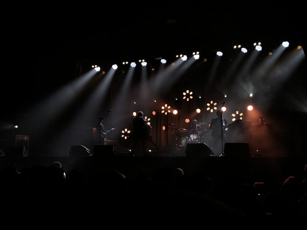 band on stage playing music