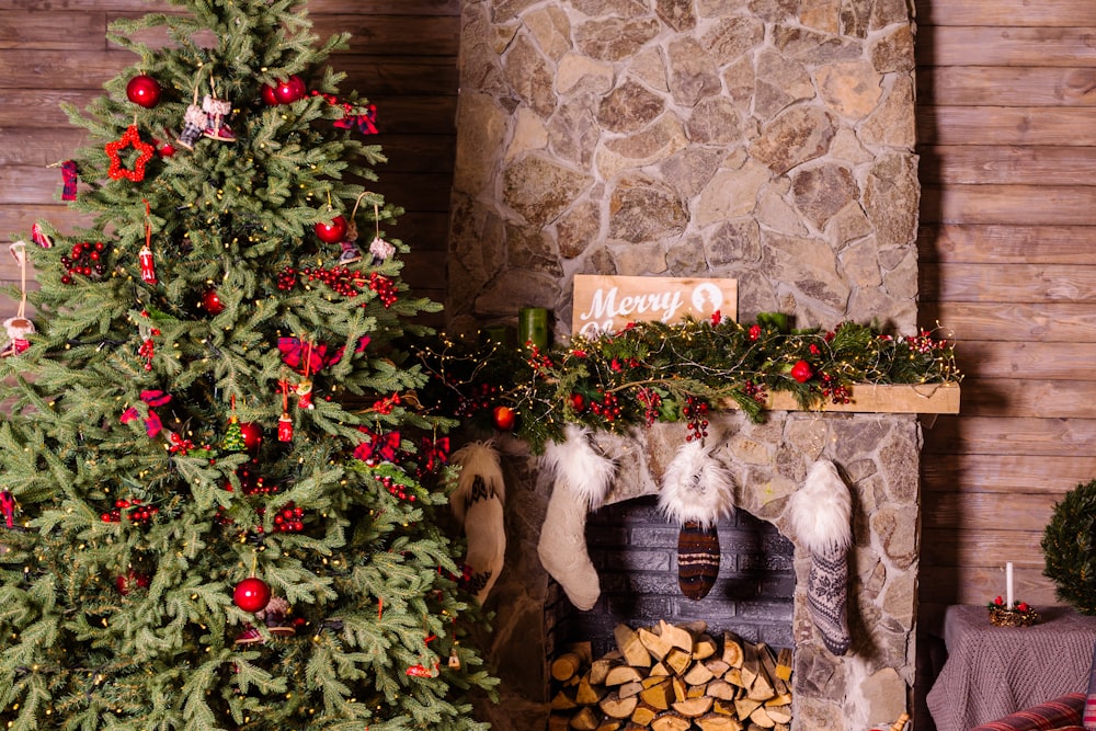 Christmas tree near fireplace