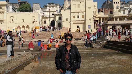 A bustling courtyard filled with people during a cultural event.