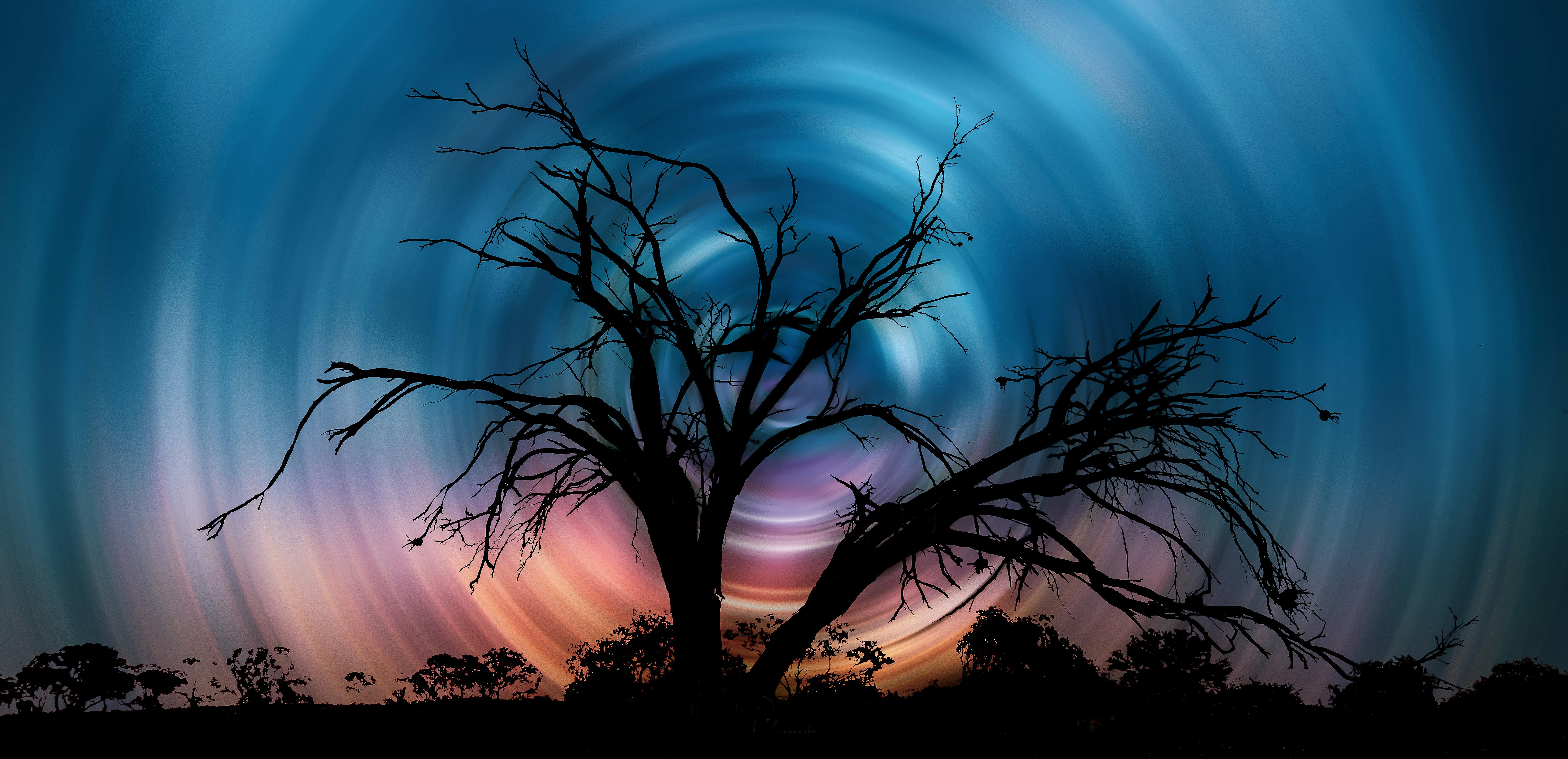 this was a sunset picture I took in western Australia and put a radial blur on the clouds