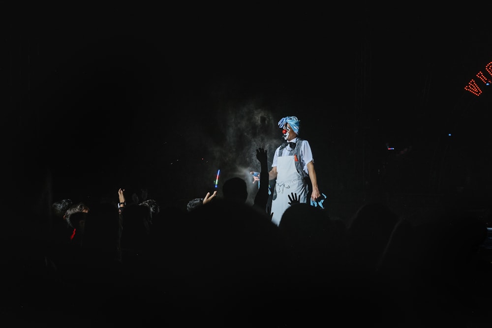 man standing while wearing white shirt