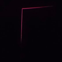 A modern contact form on a dark background with fuchsia accents.