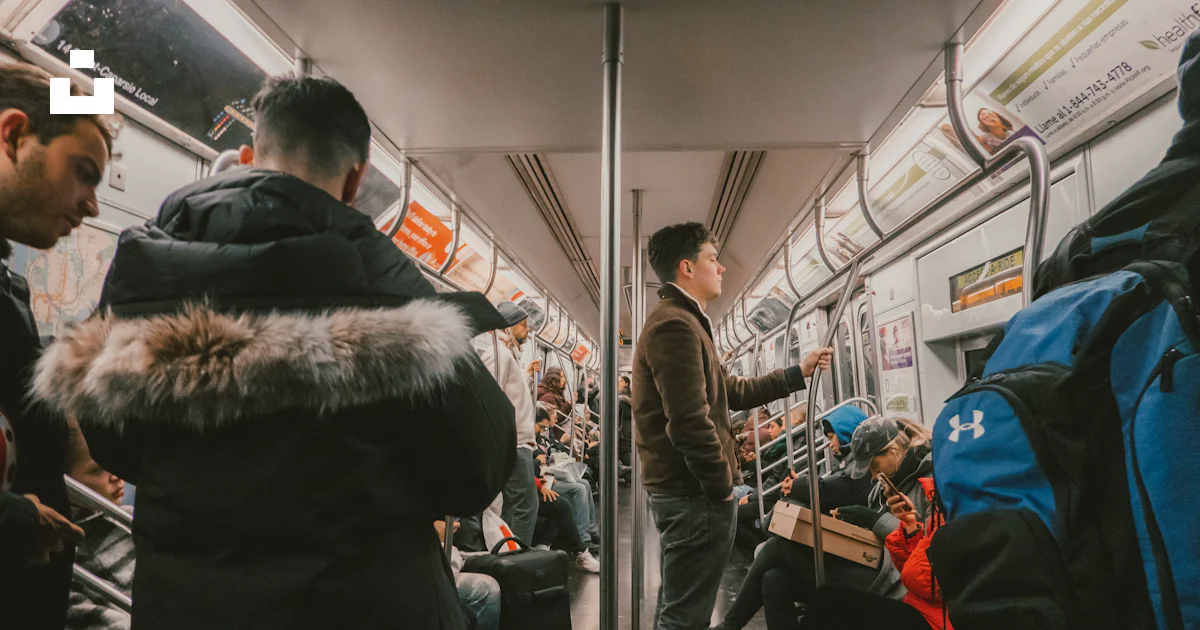 Guy Riding Train Man riding train photo – Free New york Image on Unsplash