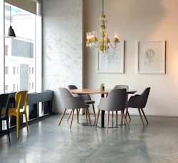 brown and grey dining set inside the room