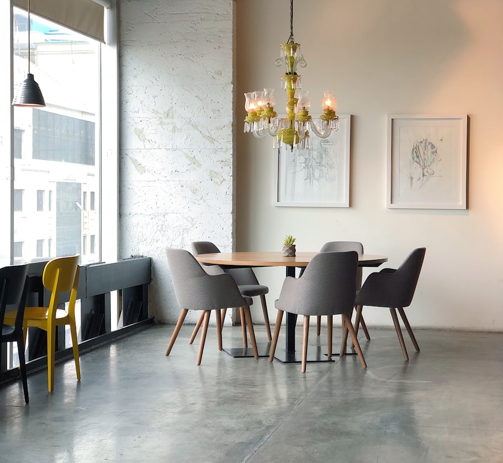 brown and grey dining set inside the room