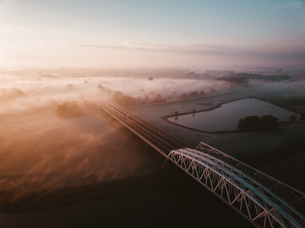 metal bridge over lake