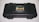 A black, hard-shell case with reinforced edges and a label in the center featuring sound wave graphics and the text 'DEITY S-Mic 2, Broadcast Quality Shotgun Microphone'. The case is sitting on a white surface.