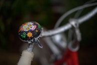 A vibrant display of colorful bike bells and grips.