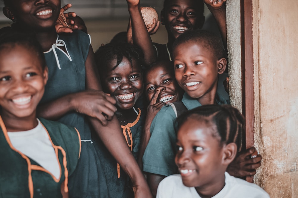 smiling children in doorway