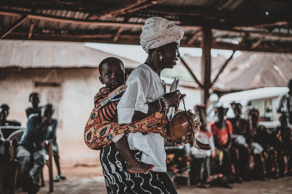 woman holding baby