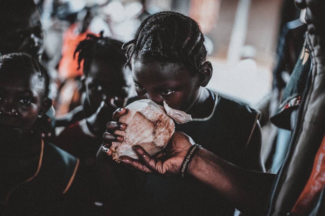 child smelling food