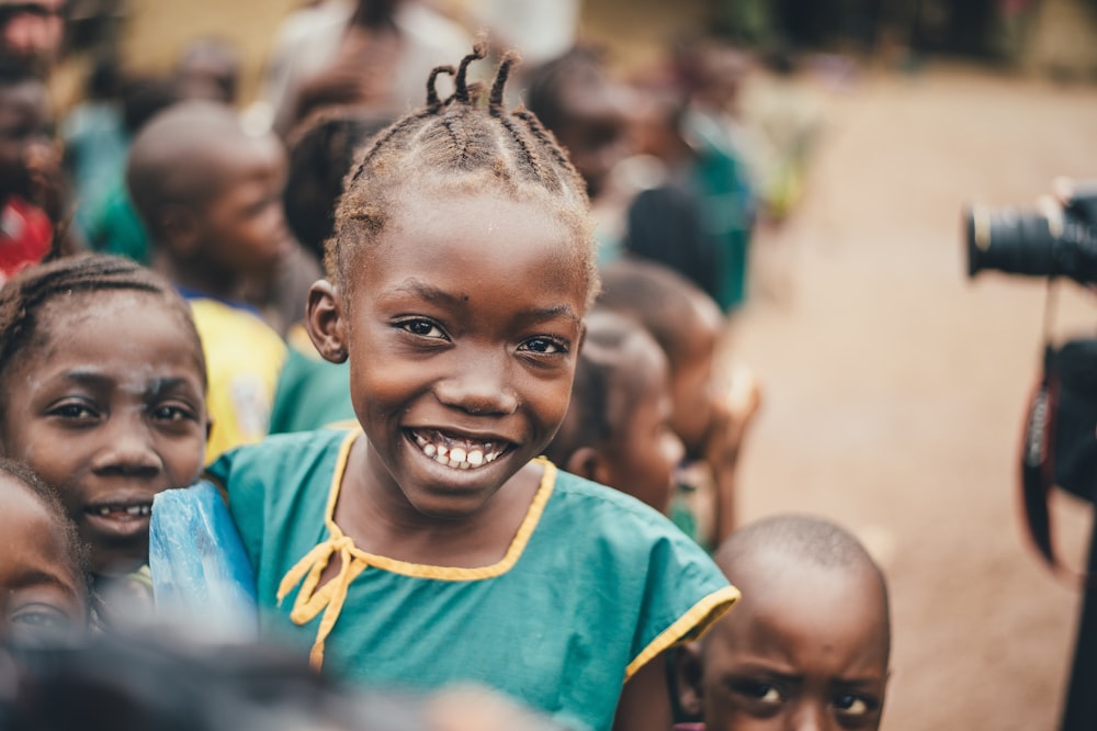 girl smiling close-up photography