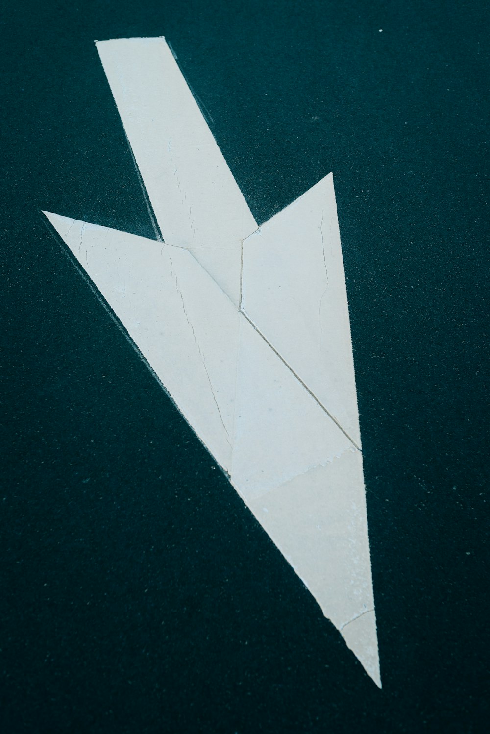 white arrow sign