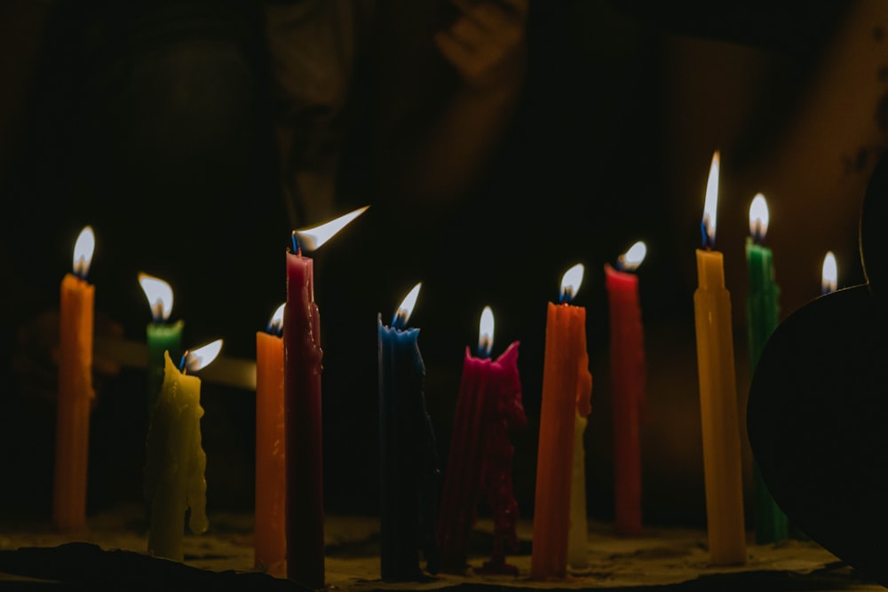 assorted-color lighted candles