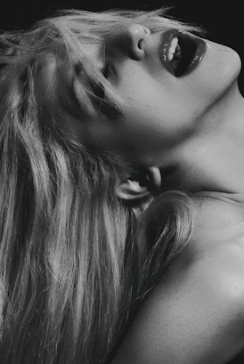 Murdered by Darkness Image  grayscale photo of woman with her mouth wide open