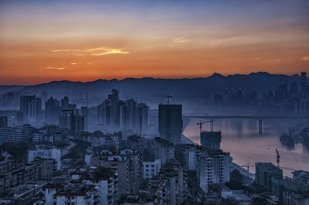 buildings near river at daytime