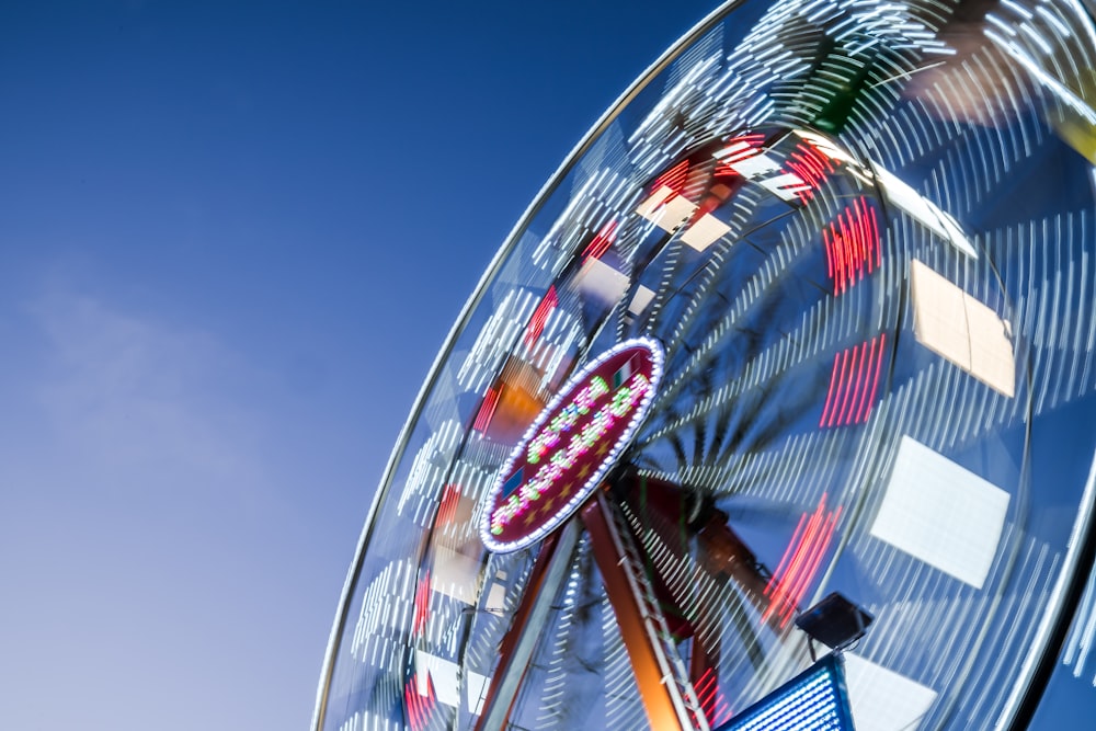 ferris wheel under clear sky at daytime