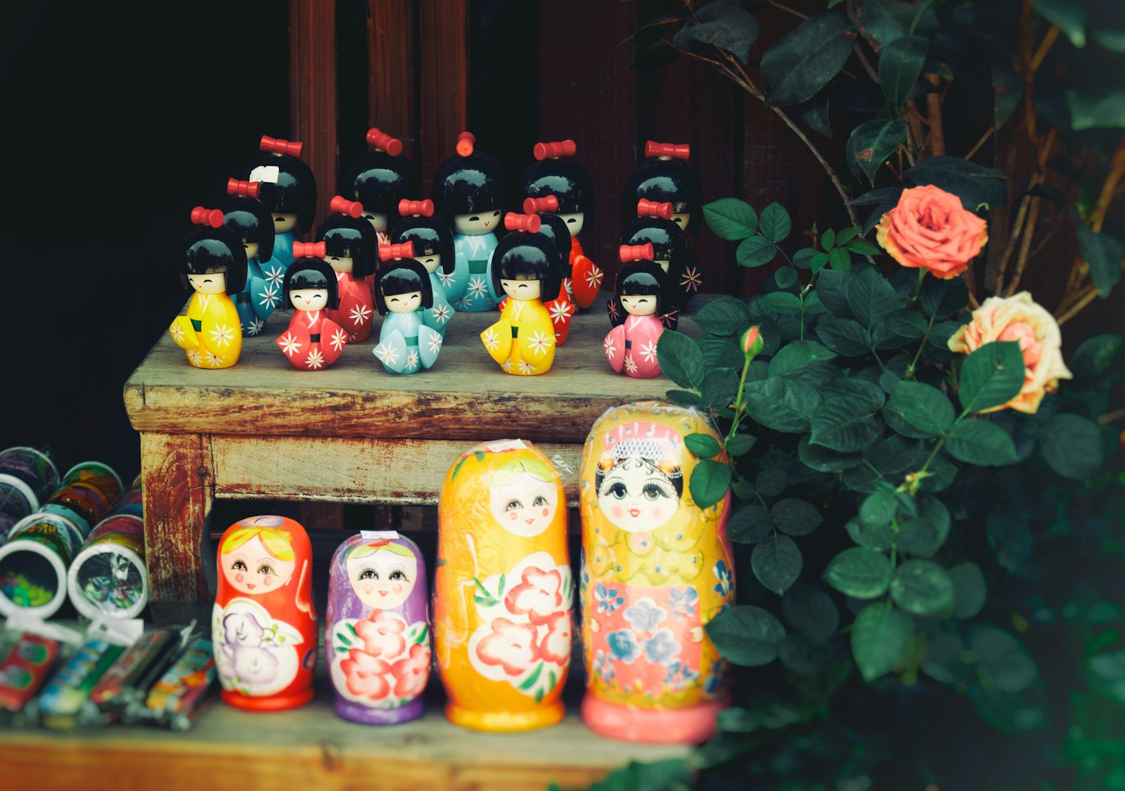 Fujifilm X-T1 + Fujifilm XF 16-55mm F2.8 R LM WR sample photo. Russian dolls near flowers photography