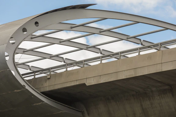 A close-up of a modern bridge with sensors visibly attached, highlighting smart monitoring technology.