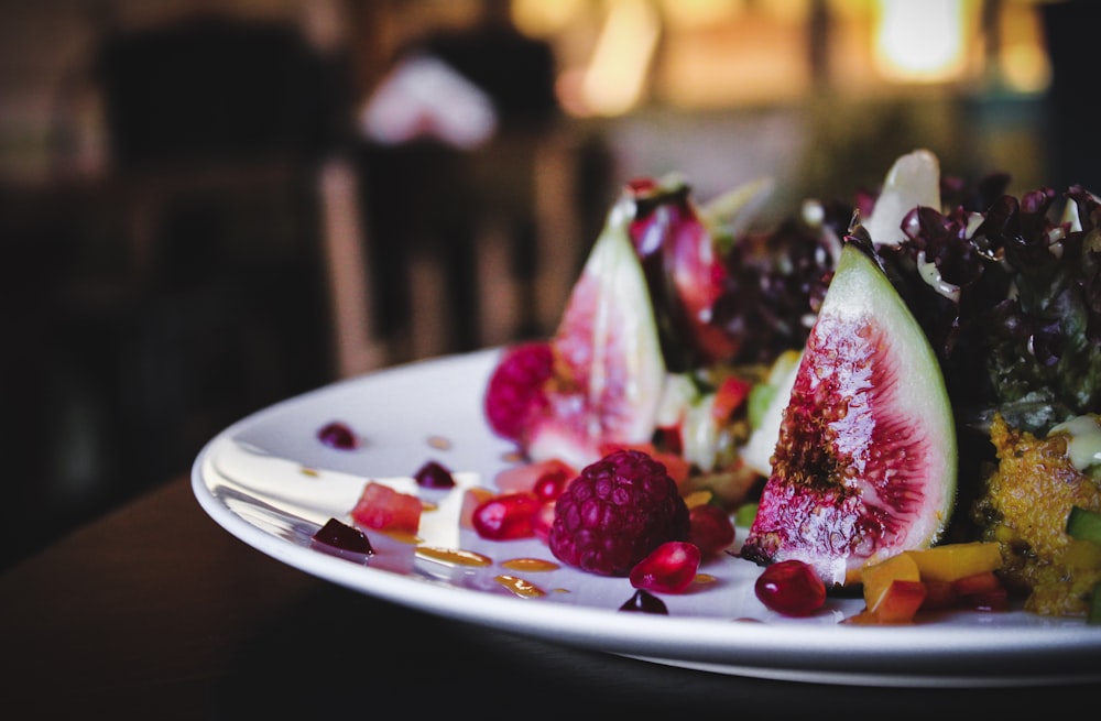 sliced pomegranate on plate