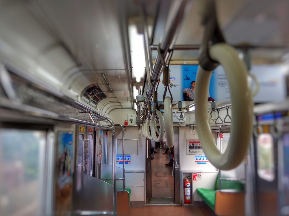selective focus photography of train interior